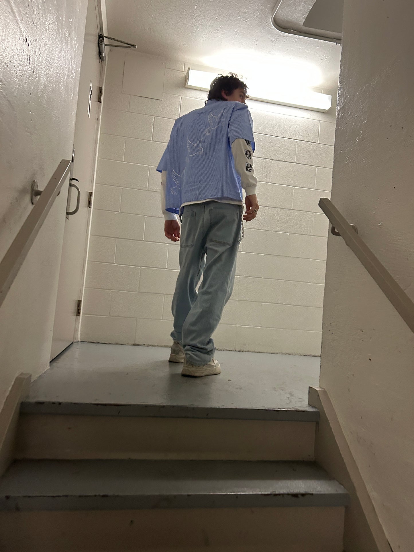 the "DOVES" button shirt