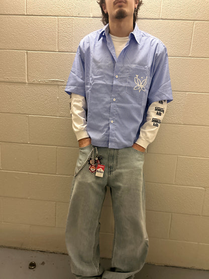 the "DOVES" button shirt